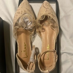 The cutest holiday shoes! They are a cream/beige color.